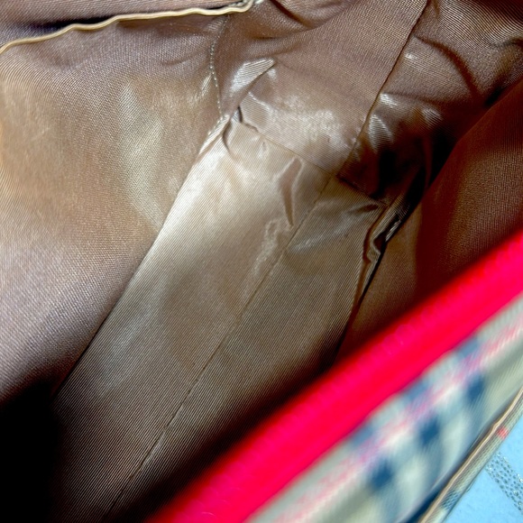 Small Burberry handbag with gold Burberry charm on the side. - Picture 4 of 4